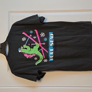 Party Pants Graphic Tee with Dinosaur Skiing Design
